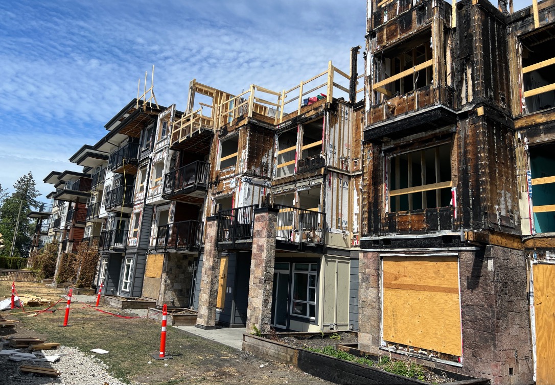 Fire-damaged multi-family residential building exterior